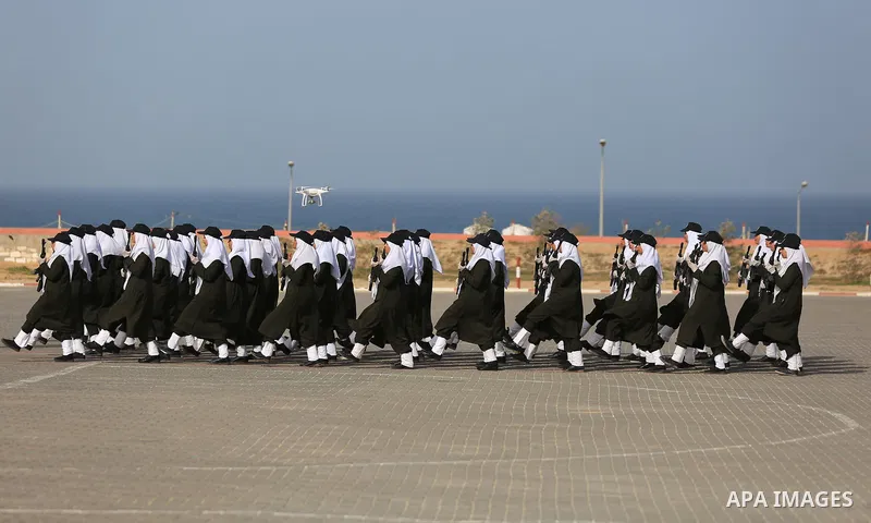 Palestinian police women show their skills during a graduation ceremony, in Gaza city on January 22, 2018. Photo by Atia Darwish