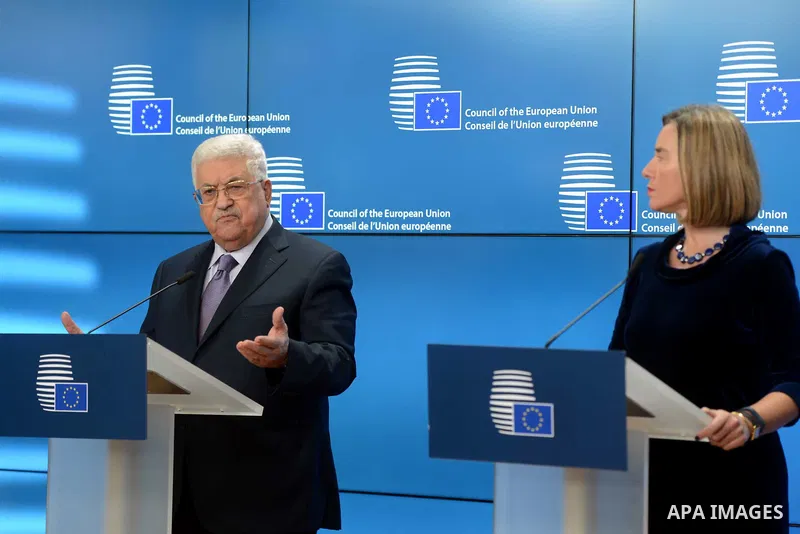 Palestinian President Mahmoud Abbas speaks as EU foreign policy chief Federica Mogherini listens prior to attend a EU foreign affairs council at the European Council in Brussels, January 22, 2018. Palestinian leader Mahm...