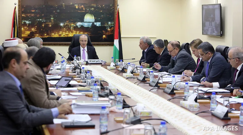 Palestinian Prime Minister, Rami Hamdallah, chairs a meeting of of council of Ministers, in the West Bank city of Ramallah, on January 23, 2018. Photo by Prime Minister Office