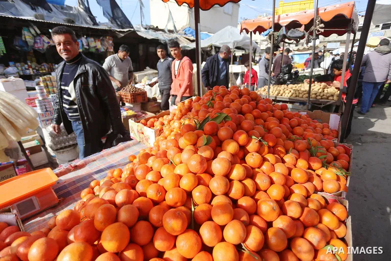 Palestinians shop at a market in Gaza city on January 23, 2018. A general commercial strike has hit the Gaza Strip to protest over worsening economic conditions and the decade-long Israeli blockade, amid warnings of an i...