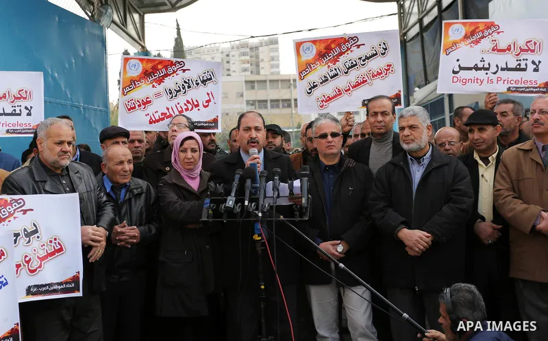 Palestinians take part in a protest against freeze tens of millions of dollars in contributions to the United Nations Relief and Work Agency (UNRWA), in Gaza city on January 23, 2018. The US State Department froze two pl...