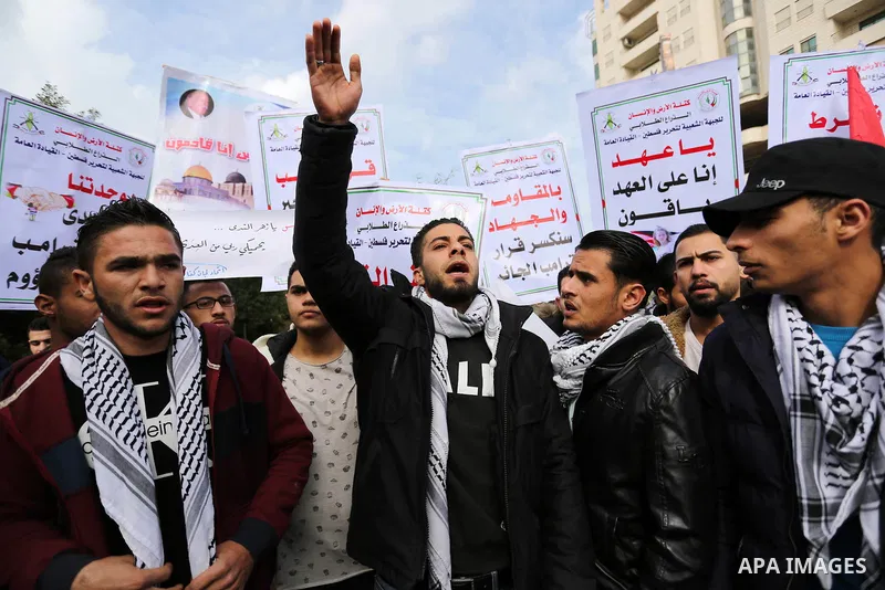 Palestinians take part in a protest against the visit of U.S. Vice President Mike Pence to Jerusalem, in Gaza city on January 23, 2018. Photo by Ashraf Amra