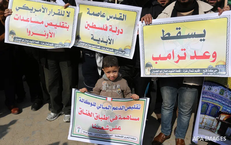 Palestinians take part in a protest against US President Donald Trump's decision to recognise Jerusalem as the capital of Israel in Jabalia in the northern Gaza Strip on January 24, 2018. Photo by Ashraf Amra