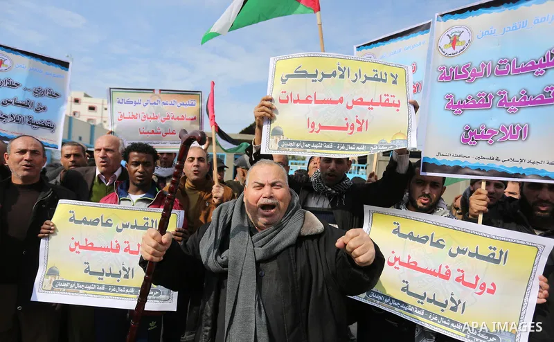 Palestinians take part in a protest against US President Donald Trump's decision to recognise Jerusalem as the capital of Israel in Jabalia in the northern Gaza Strip on January 24, 2018. Photo by Ashraf Amra