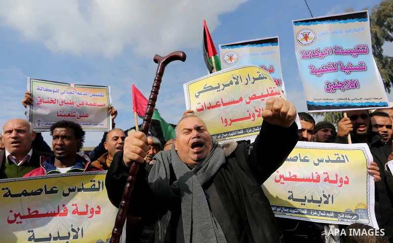 Palestinians take part in a protest against US President Donald Trump's decision to recognise Jerusalem as the capital of Israel in Jabalia in the northern Gaza Strip on January 24, 2018. Photo by Ashraf Amra