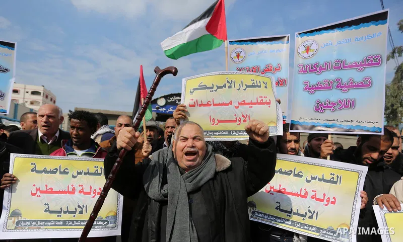 Palestinians take part in a protest against US President Donald Trump's decision to recognise Jerusalem as the capital of Israel in Jabalia in the northern Gaza Strip on January 24, 2018. Photo by Ashraf Amra