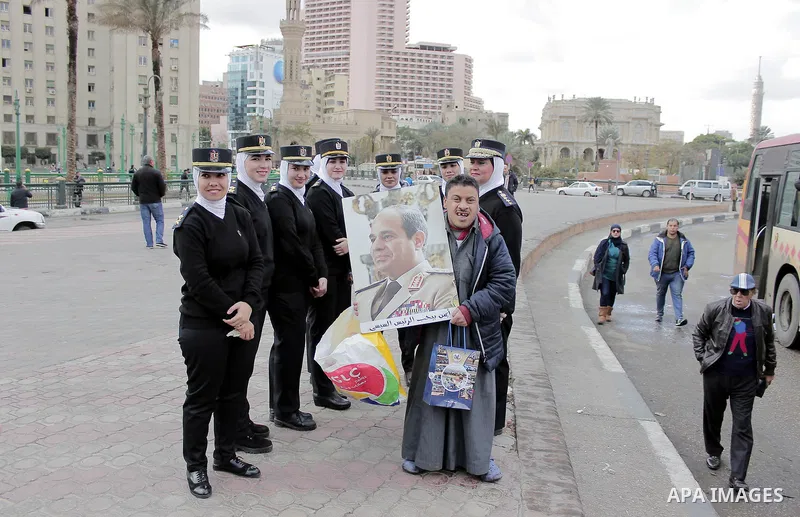 Supporters of Egyptian President Abdel Fattah al-Sisi participate in a rally held on the National Police Day that coincides with the anniversary of the Jan. 25 protests that toppled former long-time leader Hosni Mubarak...