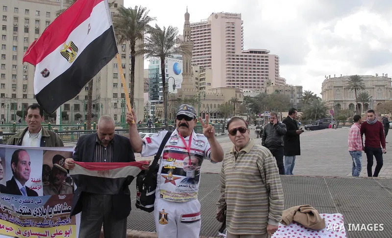 Supporters of Egyptian President Abdel Fattah al-Sisi participate in a rally held on the National Police Day that coincides with the anniversary of the Jan. 25 protests that toppled former long-time leader Hosni Mubarak...