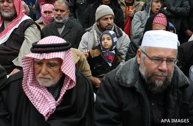 Palestinian supporters of Hamas movement take part during a protest against US President Donald Trump's decision to recognise Jerusalem as the capital of Israel, in Khan Younis in the southern Gaza Strip on January 26, 2...