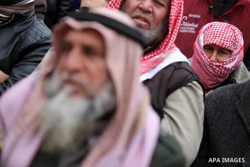 Palestinian supporters of Hamas movement take part during a protest against US President Donald Trump's decision to recognise Jerusalem as the capital of Israel, in Khan Younis in the southern Gaza Strip on January 26, 2...