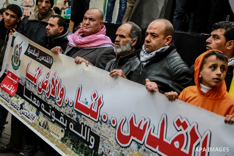 Palestinians take part in a protest against US President Donald Trump's decision to recognise Jerusalem as the capital of Israel, in Jabalia in the northern Gaza Strip on January 26, 2018. Photo by Mohammed Dahman