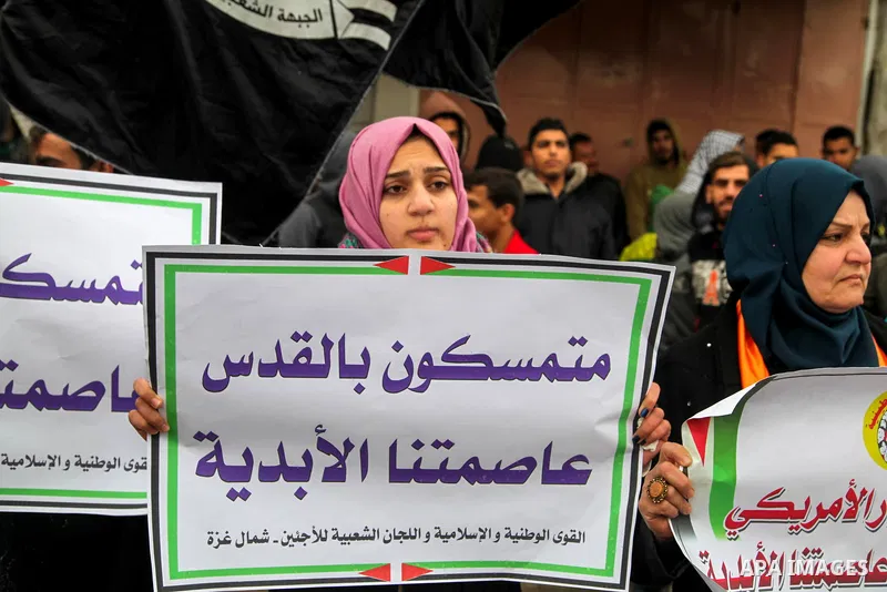 Palestinians take part in a protest against US President Donald Trump's decision to recognise Jerusalem as the capital of Israel, in Jabalia in the northern Gaza Strip on January 26, 2018. Photo by Ramez Habboub