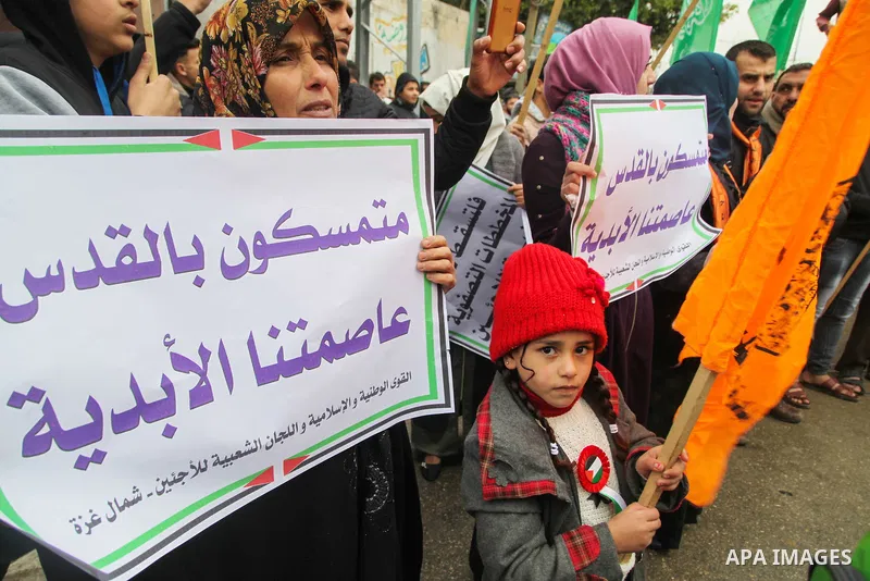 Palestinians take part in a protest against US President Donald Trump's decision to recognise Jerusalem as the capital of Israel, in Jabalia in the northern Gaza Strip on January 26, 2018. Photo by Ramez Habboub