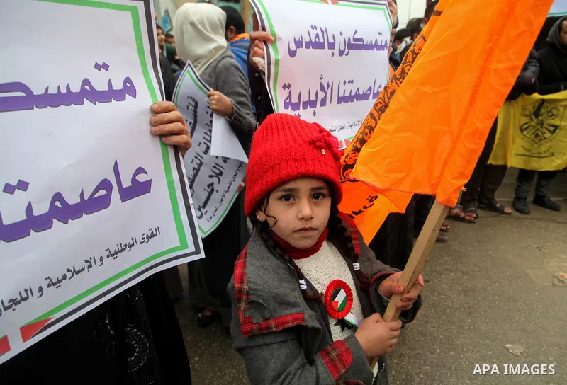 Palestinians take part in a protest against US President Donald Trump's decision to recognise Jerusalem as the capital of Israel, in Jabalia in the northern Gaza Strip on January 26, 2018. Photo by Ramez Habboub
