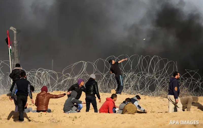 Palestinian protesters clash with Israeli security forces, as Palestinians call for 'a day of rage' against US President Donald Trump's decision to recognise Jerusalem as the capital of Israel, near the border with Israe...