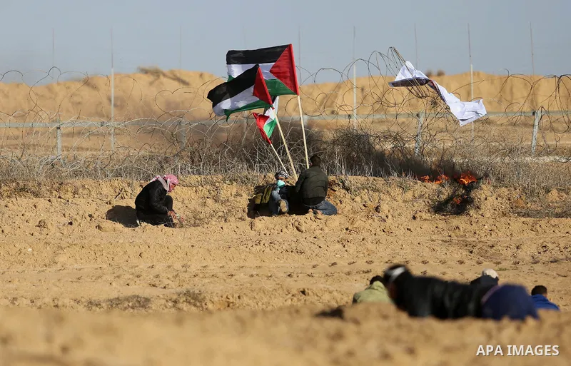 Palestinian protesters clash with Israeli security forces, as Palestinians call for 'a day of rage' against US President Donald Trump's decision to recognise Jerusalem as the capital of Israel, near the border with Israe...
