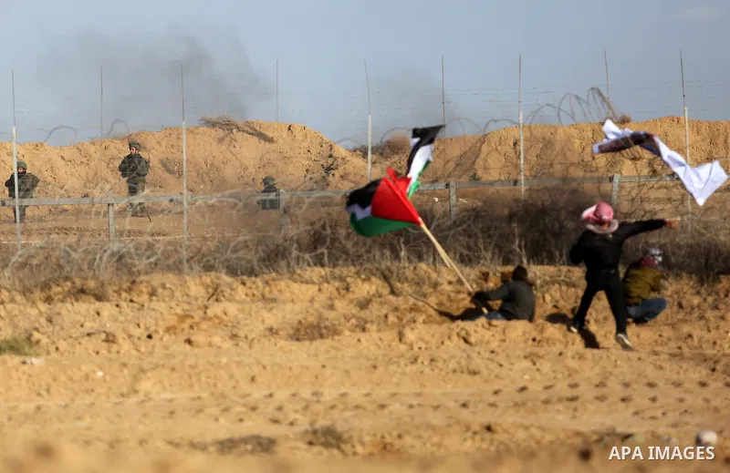 Israeli security forces take position during clashes with Palestinian protesters, as Palestinians call for 'a day of rage' against US President Donald Trump's decision to recognise Jerusalem as the capital of Israel, nea...