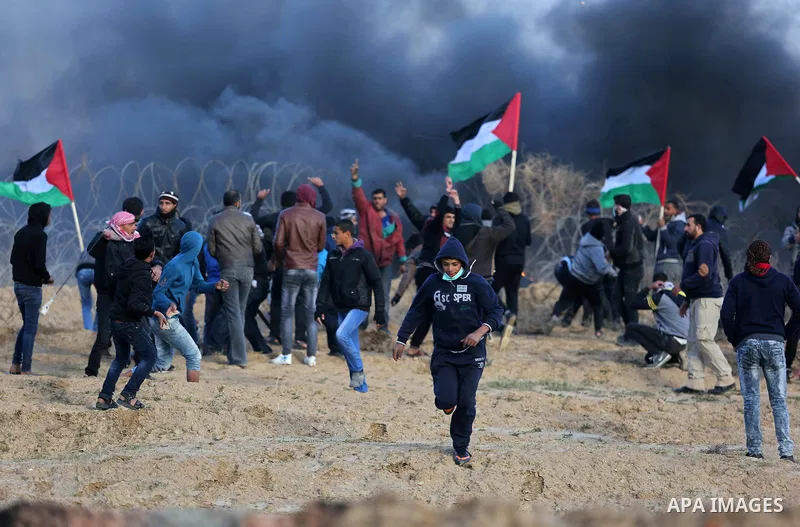 Palestinian protesters clash with Israeli security forces, as Palestinians call for 'a day of rage' against US President Donald Trump's decision to recognise Jerusalem as the capital of Israel, near the border with Israe...