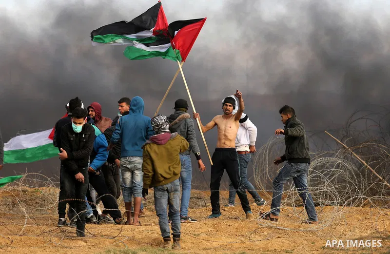 Palestinian protesters clash with Israeli security forces, as Palestinians call for 'a day of rage' against US President Donald Trump's decision to recognise Jerusalem as the capital of Israel, near the border with Israe...