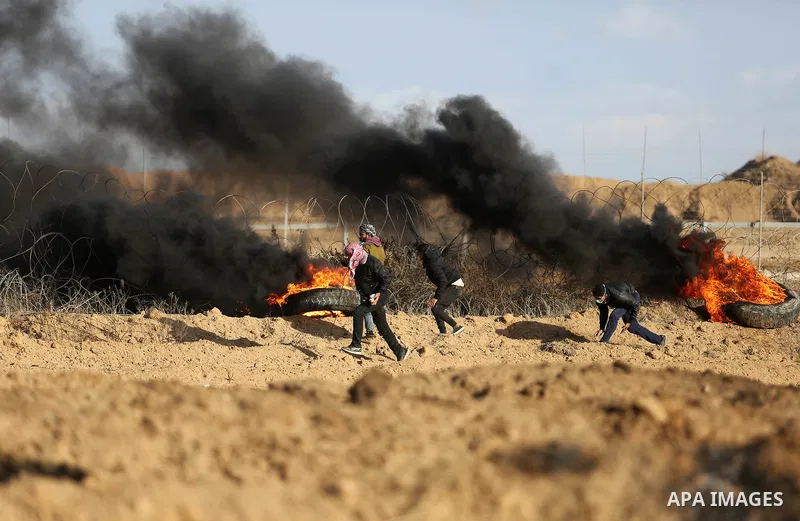 Palestinian protesters clash with Israeli security forces, as Palestinians call for 'a day of rage' against US President Donald Trump's decision to recognise Jerusalem as the capital of Israel, near the border with Israe...