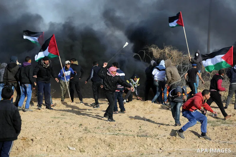 Palestinian protesters clash with Israeli security forces, as Palestinians call for 'a day of rage' against US President Donald Trump's decision to recognise Jerusalem as the capital of Israel, near the border with Israe...
