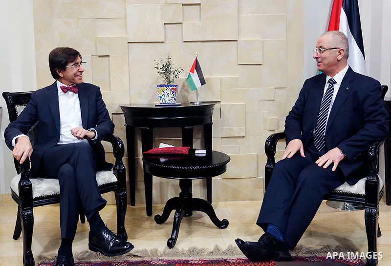 Palestinian Prime Minister Rami Hamdallah meets with President of Belgian Socialist Party (PS) Elio Di Rupo, at his office in the West Bank city of Ramallah on January 28, 2018. Photo by Prime Minister Office