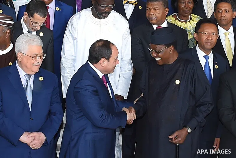 Egypt's President Abdel-Fattah el-Sisi talks to Chad's President Idriss Deby at the 30th Ordinary Session of the Assembly of the Heads of State and the Government of the African Union in Addis Ababa, Ethiopia January 28,...