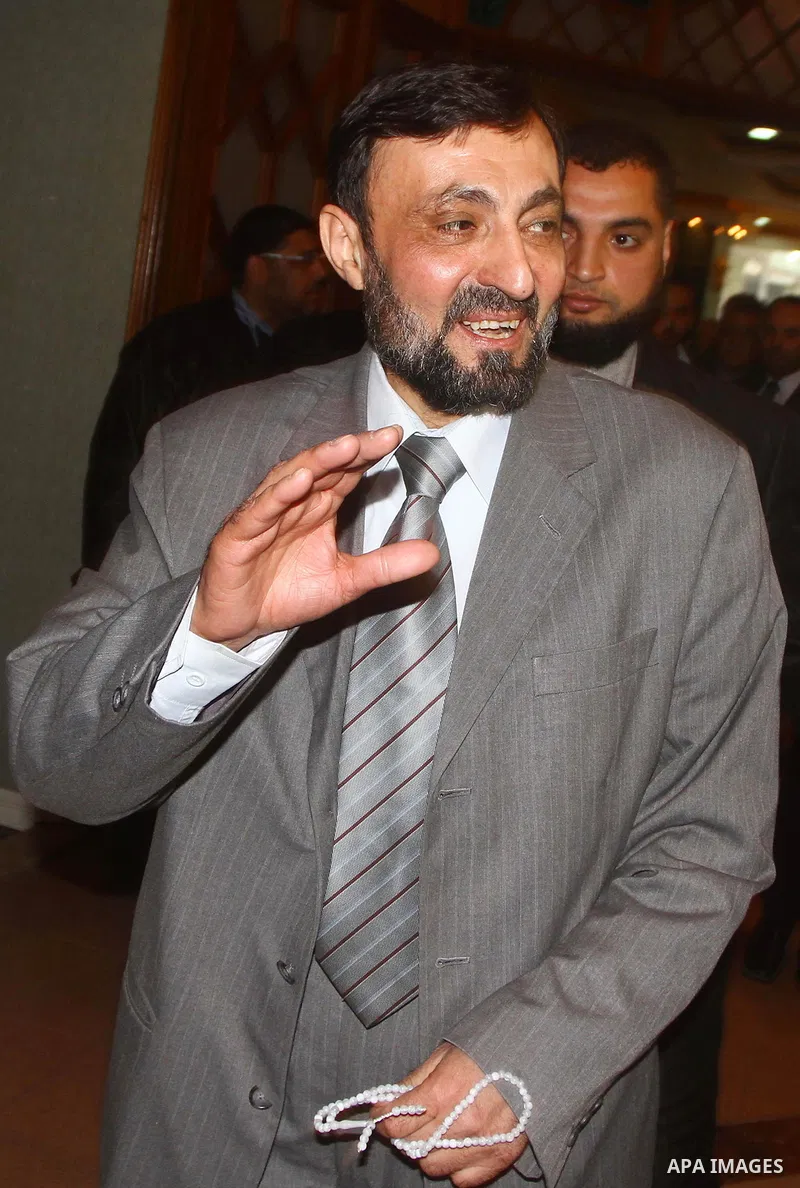 (FILES) This file photo taken on June 18, 2015 shows Hamas senior leader Imad al-Alami reacts after his arrival to Gaza Strip, in Gaza city. Al-Alami who died Tuesday, January 30, 2018 of his injuries while inspecting hi...