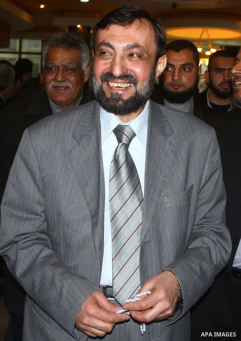 (FILES) This file photo taken on June 18, 2015 shows Hamas senior leader Imad al-Alami reacts after his arrival to Gaza Strip, in Gaza city. Al-Alami who died Tuesday, January 30, 2018 of his injuries while inspecting hi...