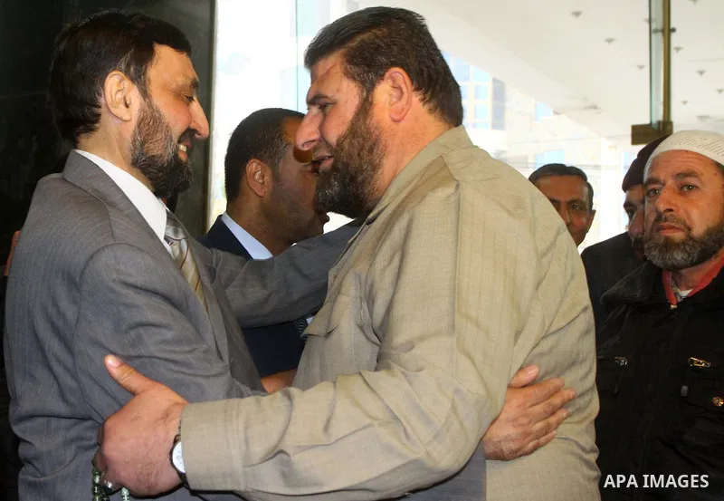 (FILES) This file photo taken on Febrayer 6, 2012 shows Hamas senior leader Imad al-Alami is welcomed by Hamas movement leaders and others after his arrival to Gaza Strip, in Gaza city. Al-Alami who died Tuesday, January...
