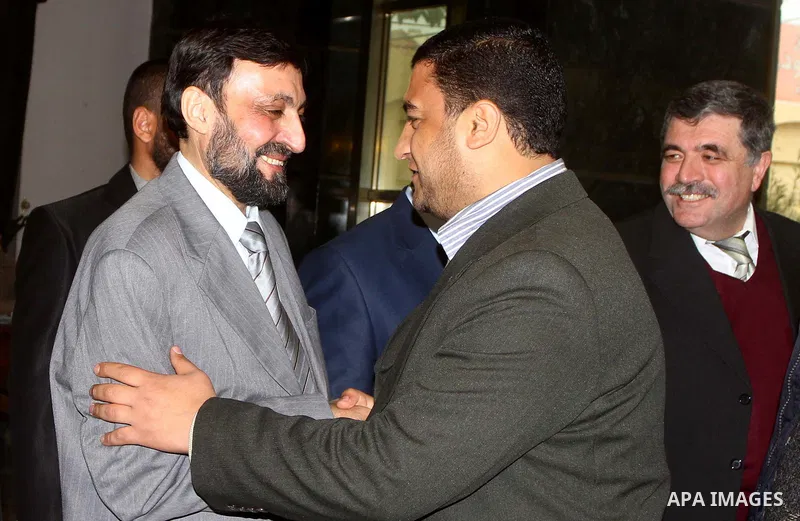 (FILES) This file photo taken on Febrayer 6, 2012 shows Hamas senior leader Imad al-Alami is welcomed by Hamas movement leaders and others after his arrival to Gaza Strip, in Gaza city. Al-Alami who died Tuesday, January...