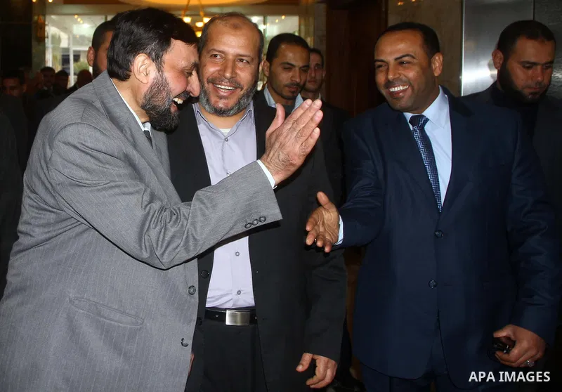 (FILES) This file photo taken on Febrayer 6, 2012 shows Hamas senior leader Imad al-Alami is welcomed by Hamas movement leaders and others after his arrival to Gaza Strip, in Gaza city. Al-Alami who died Tuesday, January...