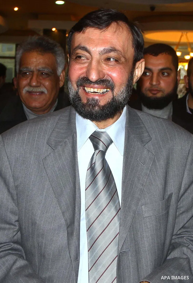 (FILES) This file photo taken on June 18, 2015 shows Hamas senior leader Imad al-Alami reacts after his arrival to Gaza Strip, in Gaza city. Al-Alami who died Tuesday, January 30, 2018 of his injuries while inspecting hi...