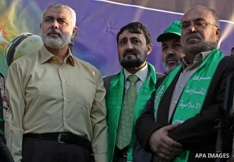 (FILES) This file photo taken on November 14, 2013 shows Hamas senior leader Imad al-Alami takes part in an anti-Israel parade as part of the celebrations marking the first anniversary of an Israeli army operation in Gaz...