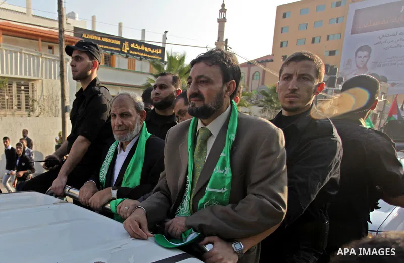(FILES) This file photo taken on November 14, 2013 shows Hamas senior leader Imad al-Alami takes part in an anti-Israel parade as part of the celebrations marking the first anniversary of an Israeli army operation in Gaz...