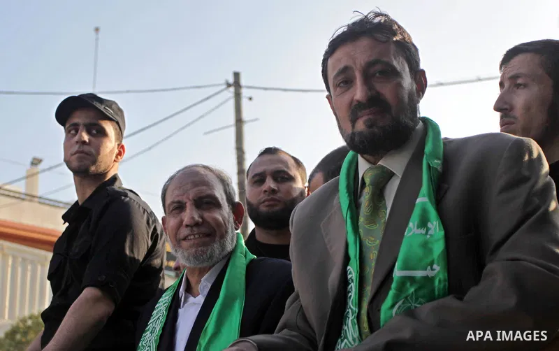 (FILES) This file photo taken on November 14, 2013 shows Hamas senior leader Imad al-Alami takes part in an anti-Israel parade as part of the celebrations marking the first anniversary of an Israeli army operation in Gaz...