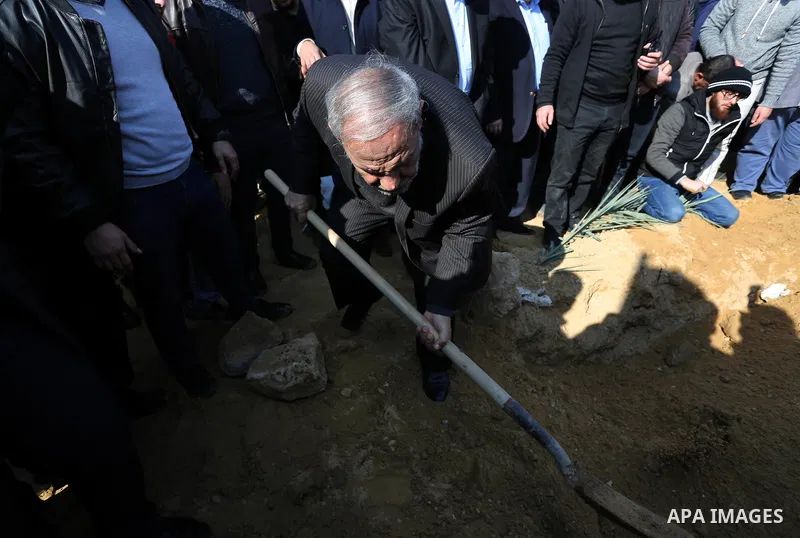 Senior Hamas leader Mahmoud al-Zahar participates in the burial of Hamas senior leader Imad al-Alami at a cemetery in Gaza City on January 30, 2018. A senior Hamas official has died in Gaza three weeks after shooting him...