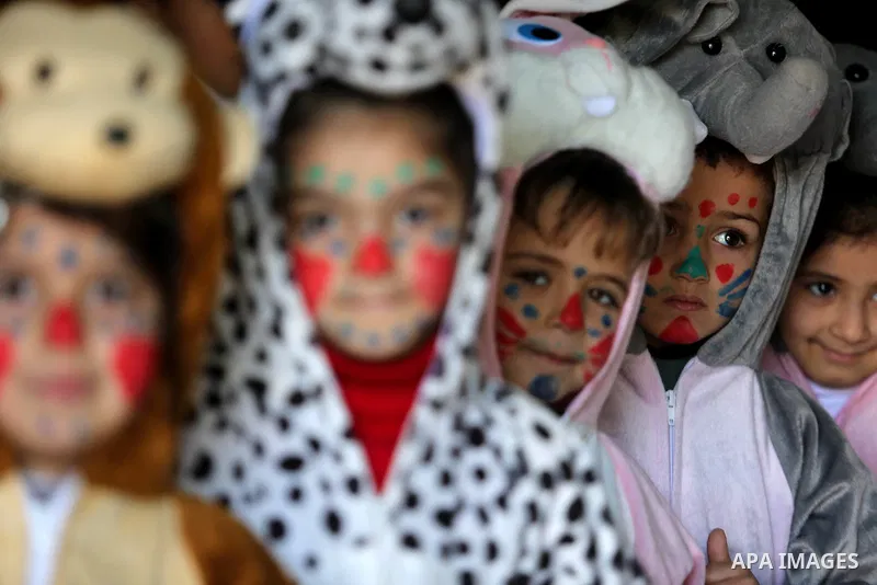 Palestinian children take part during a "joy and fun" festival for Palestinian school students which organized by Gaza Municipality in Gaza city on January 30, 2018. Photo by Ashraf Amra