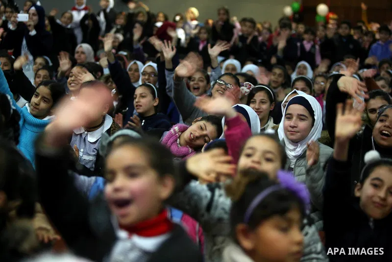 Palestinian school students attend a "joy and fun" festival which organized by Gaza Municipality in Gaza city on January 30, 2018. Photo by Ashraf Amra