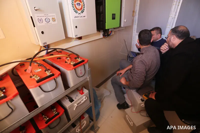 Palestinian workers inspect the run generators at the Mohammed al-Dorra pediatric hospital in Gaza city on January 31, 2018 after it ran out of fuel. For months Gaza’s health ministry has been warning that it will be for...