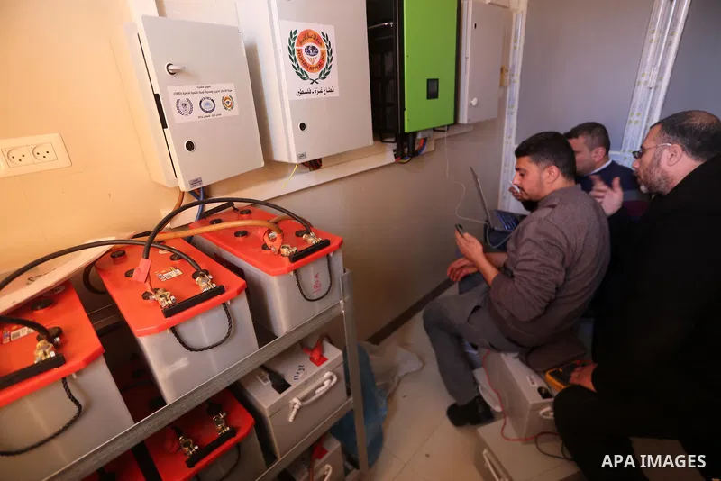 Palestinian workers inspect the run generators at the Mohammed al-Dorra pediatric hospital in Gaza city on January 31, 2018 after it ran out of fuel. For months Gaza’s health ministry has been warning that it will be for...