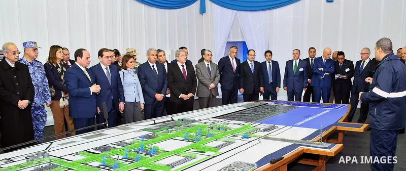 Egyptian President Abdel Fattah al-Sisi looks at mockups of natural gas extraction facilities during the inauguruation of the offshore Zohr gas field in the northern Suez canal city of Port Said, on January 31, 2018. At...
