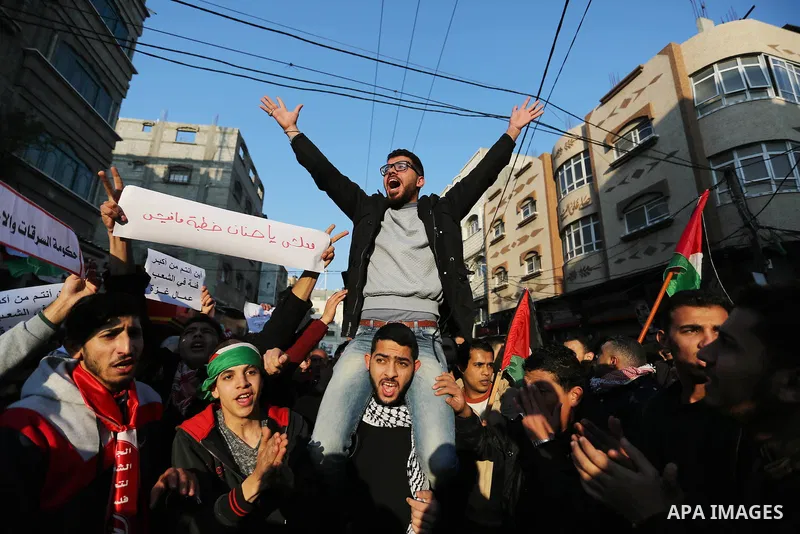 Palestinians participate in a demonstration to support the palestinian reconciliation efforts between Fatah and Hamas, and demand better living conditions, in Jabalia in the northern Gaza Strip on February 01, 2018. Phot...