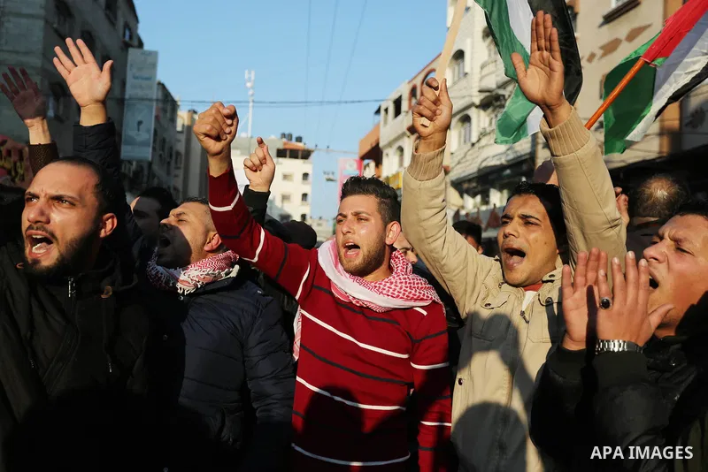 Palestinians participate in a demonstration to support the palestinian reconciliation efforts between Fatah and Hamas, and demand better living conditions, in Jabalia in the northern Gaza Strip on February 01, 2018. Phot...