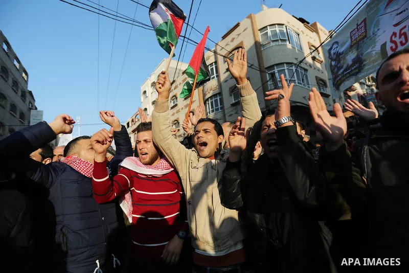 Palestinians participate in a demonstration to support the palestinian reconciliation efforts between Fatah and Hamas, and demand better living conditions, in Jabalia in the northern Gaza Strip on February 01, 2018. Phot...