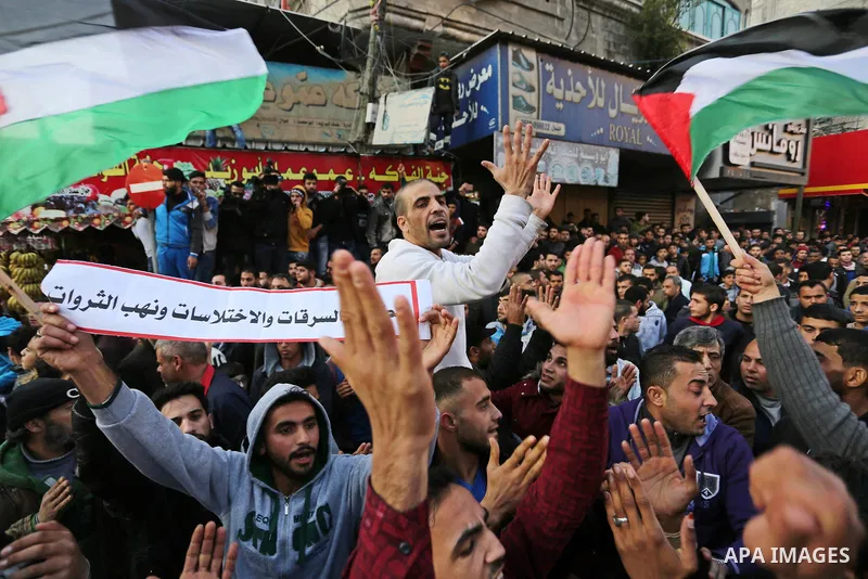 Palestinians participate in a demonstration to support the palestinian reconciliation efforts between Fatah and Hamas, and demand better living conditions, in Jabalia in the northern Gaza Strip on February 01, 2018. Phot...
