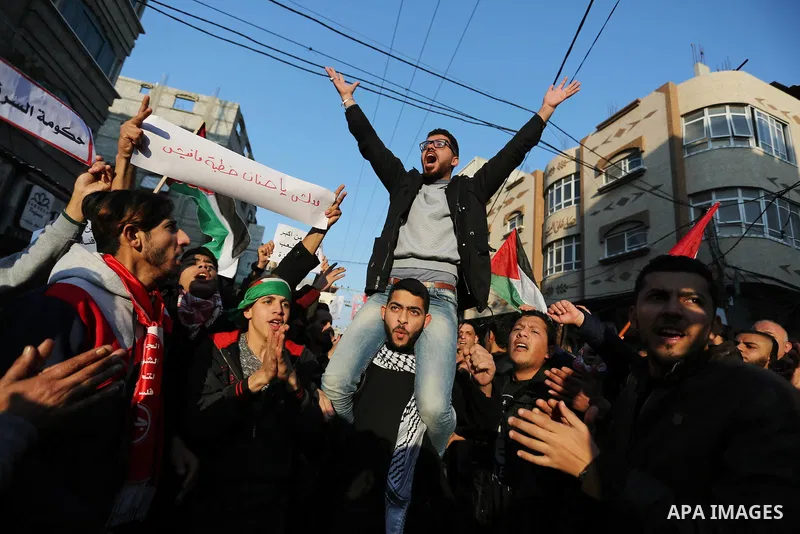 Palestinians participate in a demonstration to support the palestinian reconciliation efforts between Fatah and Hamas, and demand better living conditions, in Jabalia in the northern Gaza Strip on February 01, 2018. Phot...