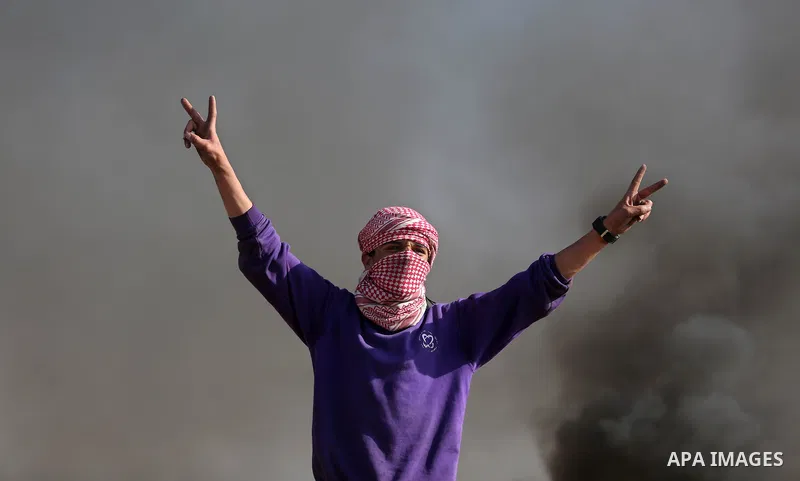 Palestinian protesters clash with Israeli security forces, against US President Donald Trump's decision to recognise Jerusalem as the capital of Israel, near the border with Israel in the southern Gaza Strip on February...