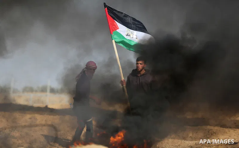 Palestinian protesters clash with Israeli security forces, against US President Donald Trump's decision to recognise Jerusalem as the capital of Israel, near the border with Israel in the southern Gaza Strip on February...