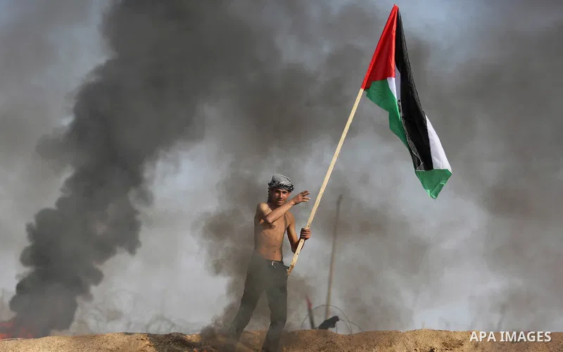 Palestinian protesters clash with Israeli security forces, against US President Donald Trump's decision to recognise Jerusalem as the capital of Israel, near the border with Israel in the southern Gaza Strip on February...